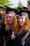 Social work majors Rachel Phillips and Leslie Ragon show excitement at the spring 2010 commencement ceremony. 
 - Photo by Ebbie Davis