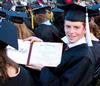 David Kissell, Christian studies graduate, shows off his diploma at the spring 2010 commencement ceremony.   - Photo by Ebbie Davis