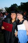 TESL graduate Melissa Jepsen celebrates with friend Alice Nettles following the spring 2010 graduation ceremony.  - Photo by Ebbie Davis