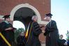 Noah Arnold receives his diploma from Dr. David S. Dockery at the spring 2010 commencement ceremony.  - Photo by Morris Abernathy