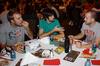 Graduating seniors Michael Grubb, Kevin Bradley, and Justin Hobbs talk over lunch at The Last Hurrah, a luncheon held in honor of graduating seniors.  - Photo by Ebbie Davis
