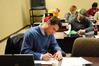 Students work diligently in a BSOL Degree Program class.  - Photo by Morris Abernathy