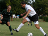Senior Kekec Zivkovic (10) uses some fancy footwork during recent game. - Photo by Jonathan Blair