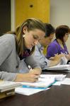 Students take notes in Dr. Patricia Hamilton's English class.  - Photo by Morris Abernathy