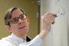 Dr. David Ward, professor of physics, teaches a class.  - Photo by Morris Abernathy