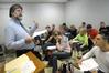 Roger Stanley, assistant professor of English, teaches a class. - Photo by Morris Abernathy