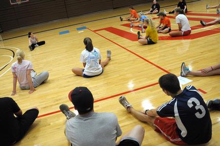 Students participate in a workout session in the Fred Delay Gym.