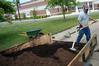 Facilities Management works to make the campus look beautiful for the Spring.  - Photo by Morris Abernathy