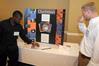 Engineering majors Tayo Adedokun and Rhett Woody prepare to present their semester long project for the annual scholarship symposium. - Photo by Morris Abernathy