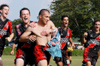 Freshman Duncan Nicol (left to right), freshman Garent Munro, junior Redzi Stojiljkovic, freshman Alexandre Pereira and senior Kyle McDiarmid congratulate one another after an early goal in the Fifth Annual Jackson Soccer Cup against Lambuth. - Photo by Justin Veneman