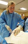 Nursing students work on simulations in Providence Hall. - Photo by Morris Abernathy