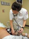 Nursing students work on simulations in Providence Hall. - Photo by Morris Abernathy