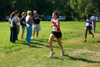 Courtney Owens runs alone during this portion of the race.
 - Photo by Uncredited