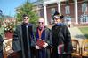 Dr. Dockery is joined by Dr. Carla D. Sanderson and Dr. Charles  A. Fowler at the summer commencement service. - Photo by Morris Abernathy