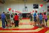 Incoming freshmen and their family members gather in the Fred DeLay Gym to check in and receive room keys during New Student Move In Day.  - Photo by Abigail Harris