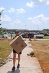 Elsie Krinsky, sophomore nursing major, helps her new roommate move into the recently constructed Hope Complex on Move In Day.  - Photo by Victoria Stargel