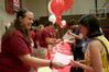 Lauren Smith, senior nursing major, gives incoming freshman, Ashley Garrett from Collierville, Tenn., her housing information for the 2010 Fall semester. - Photo by Deanna Santangelo