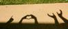 Taking a break from moving in, Union students play with shadows to express how they feel about Union.  - Photo by Ebbie Davis