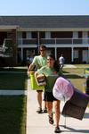 Life Group leaders Spencer Connatser and Elsie Krinsky offer helping heads as new students move onto Union's campus.  - Photo by Ebbie Davis