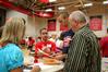 Mark Mogle, an enrollment counselor, assists incoming freshman Taylor LaRue and his parents Kimsey and Mark LaRue from Savannah, Tenn, as they check in on Move In Day.  - Photo by Deanna Santangelo