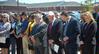 Faculty, staff, and friends of Union bow in prayer during the dedication service for the Hope Residence Complex.  - Photo by Morris Abernathy