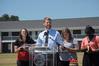Luke Pruett, residence director, reads scripture at the dedication of the Hope Residence Complex.  - Photo by Morris Abernathy