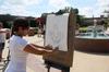 Alesia Fisher, freshman art major, draws the fountain during drawing class outside.  - Photo by Ebbie Davis
