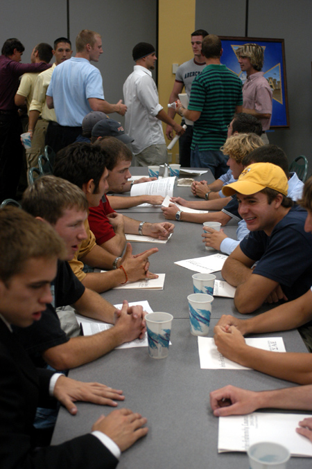 A group of rushees visit with one another during the Inter-Fraternity Council's open party. The IFC party is the official start to guys' rush.
