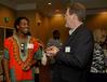 Derique Cannon, junior electrical engineer major, talks with John Netland, professor of English and department chair, at the President's Reception in the Grant Center. - Photo by Deanna Santangelo