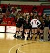 Kelly Elliot, head coach, and Ariel Apolinario, assistant coach, talk with the volleyball team during a game against Lyon College.  - Photo by Deanna Santangelo