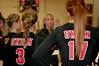 Kelly Elliot, head coach, talks with the volleyball team during a time out in a match against Lyon College. The Lady Bulldogs won 3-1. - Photo by Deanna Santangelo