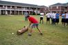 Zachary Key, junior medical technology major, works hard to split a log for his team during the log splitting portion of the Watters Great Outdoors event. - Photo by Deanna Santangelo