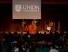Russ Pflasterer, pastor of City Fellowship in Jackson, Tennessee, leads music during chapel. - Photo by Ebbie Davis