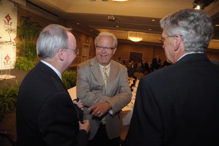 Dennis Swanberg talks with President David S. Dockery and Richard Wells, vice president of church relations, at the West Tennessee Pastors Appreciation Banquet. 