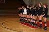 The Lady Bulldog volleyball girls bow their heads for prayer before a game against Martin Methodist. - Photo by Deanna Santangelo