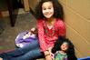 Hailey Jackson, daughter of Paul Jackson, professor of Biblical studies, smiles as she plays with her doll during the Go Week: Reaching the Nations through Adoption event.  - Photo by Deanna Santangelo