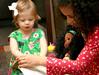 Norah-Kate Carothers, daughter of David Carothers, and Hailey Jackson, daughter of Paul Jackson, play together at Go Week: Reaching the Nations through Adoption.  - Photo by Deanna Santangelo