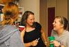 Kristen Wells, assistant residence director, laughs with Samantha Dodson, junior learning foundations major at Progressive Snacking.  - Photo by Victoria Stargel