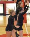 Heather Lieberman (top), Shelby Swink and Caroline Robbins prepare to block the opponent's attack. - Photo by Steven Aldridge