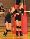 Emmie Moroski (8) and Anna Sims move into position. - Photo by Steven Aldridge