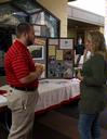 The annual GO Week gives students a chance to talk to local organizations about how they can get involved. Kevin Adelsberger, representative from RIFA and Union alum, talks to Jessica Duck, sophomore psychology major about opportunities at RIFA.  - Photo by Ebbie Davis
