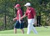 Josh Bratcher (right) and Matt Kelley talk during a round of golf. - Photo by Steven Aldridge