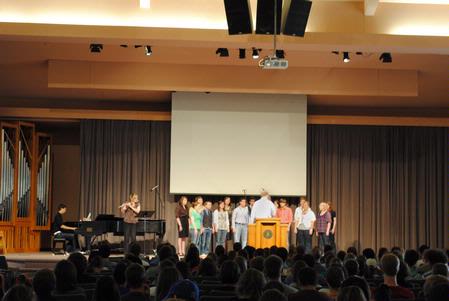 Voices of Proclamation performs at chapel.
