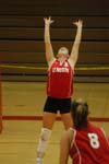 Junior setter Nicole Garber (3) sets up one of her teammates.  Jennie Glassey (8) looks on. - Photo by Steven Aldridge