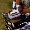 Soccer players rest on the bench during the game against Mid-Continent University.  - Photo by Ebbie Davis