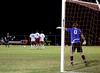 Bulldog soccer players prepare to block a direct kick from Mid-Continent University during an October game.  - Photo by Ebbie Davis