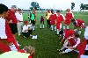 Pregame instructions from Coach Darin White
 - Photo by Jim Veneman