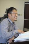 Kevin Chen, assistant professor of Biblical studies, laughs during a class discussion.  - Photo by Morris Abernathy