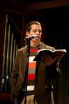 Weston Wax, junior church history major, reads a scripture passage during chapel. - Photo by Deanna Santangelo