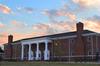 A West Tennessee sunset paints the sky behind the Bowld Student Commons. - Photo by Victoria Stargel